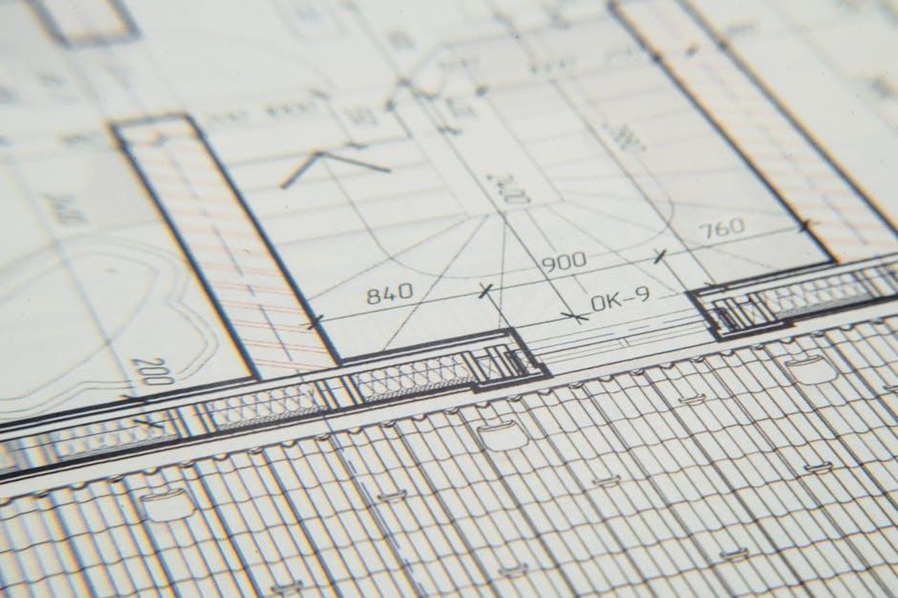 Allegati_dellarticolo_SKmqeJGRlU - Veicoli24 Source: Ivan Samkov - pexels - Close-up of an architectural blueprint showcasing intricate design details for a building layout.