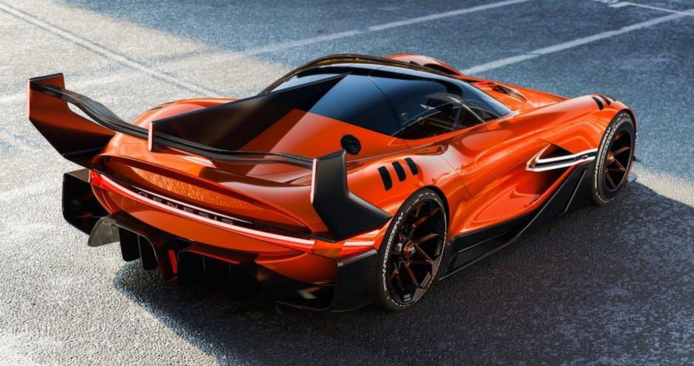 Genesis_Magma_Racing_e_futuro_ibrido_u5TJDWvLmI - Veicoli24 Source: Hyundai Motor Group - pexels - Stunning Genesis concept car showcasing sleek, futuristic design and luxury on an open road.
