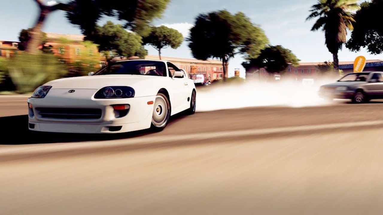 Il_futuro_della_Supra_e_del_supercar_LFR_UBUs8FRmb9 - Veicoli24 Source: Pixabay - pexels - A white sports car drifting on a sunny day with smoke trail on an urban road.